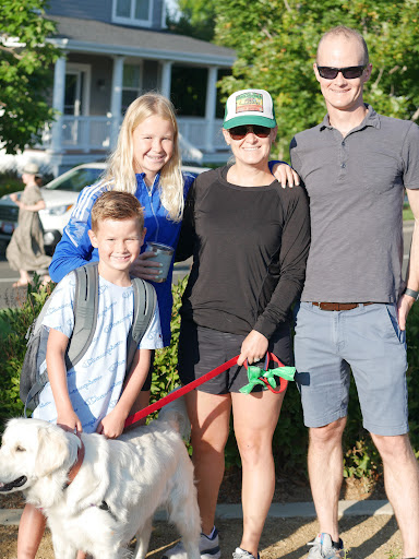 Family posing for back to school night